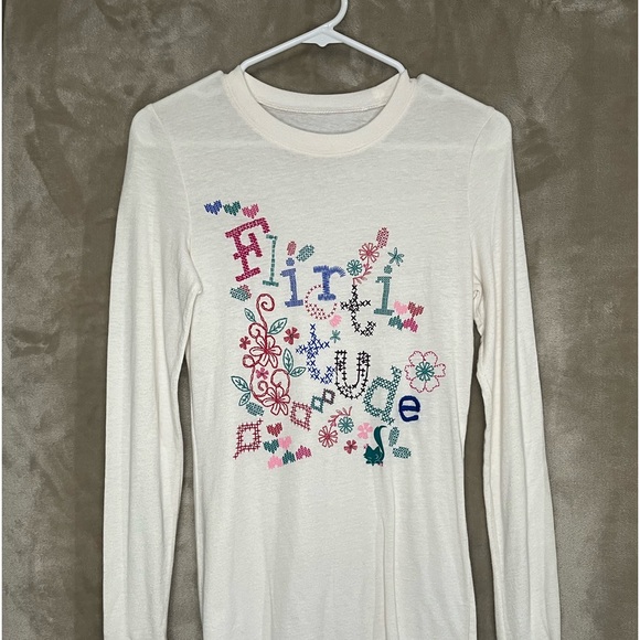 FLIRTITUDE LONG-SLEEVE TOP - Picture 2 of 10